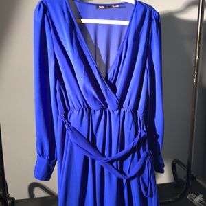 Long blue dress. Low cut. Long sleeve.short to low